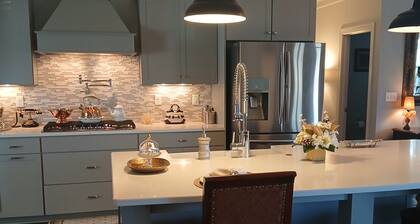 Master's Week -- Elegant 4-bedroom house in Evans with luxurious living spaces!