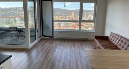 Apartment with panoramic view by the hockey arena with AC