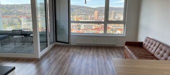 Apartment with panoramic view by the hockey arena with AC