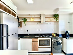 Private kitchen - Comfort club with ocean view, air conditioning and nearby. Beto Carrero (Penha)