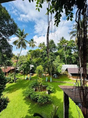 Family Triple Room, Balcony, Garden View | Property grounds - Airport Heritage (andiambalama)