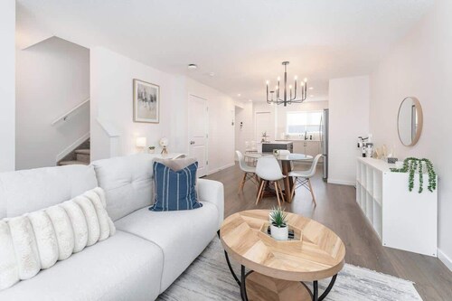 Modern 3BR Home with Parking Near Airport & QEII