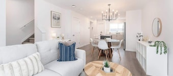 Modern 3BR Home with Parking Near Airport & QEII