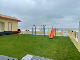 Royal cottage, uitzicht op zwembad | Kindergedeelte