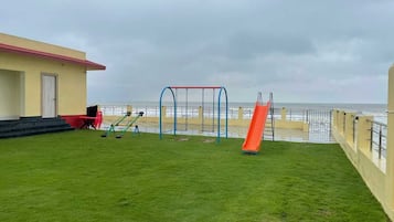 Royal Cottage, Pool View | Children’s play area – outdoor