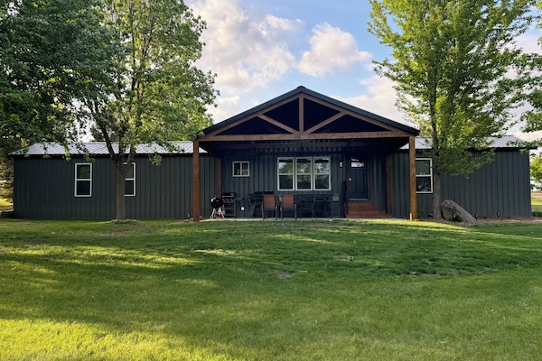 Enjoy morning coffee or evening dinners on the large covered patio.