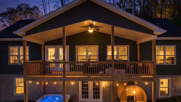 A two-story house with a balcony, a hot tub, and a circular wooden structure. - Luxury Mountain Retreat w/ Valley Views, Hot Tub (Front Royal)