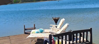 Cozy vacation home on Lake Lübbesee with terrace, garden and jetty on the lake