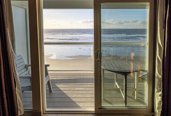 Interior - Condo #204 with beautiful sunset view from your balcony overlooking the ocean (Lincoln City)