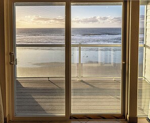 Interior - Condo #204 with beautiful sunset view from your balcony overlooking the ocean (Lincoln City)