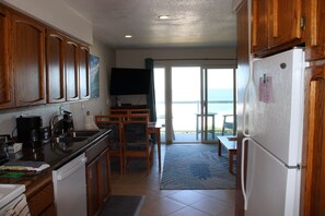 Fridge, microwave, oven, dishwasher - Condo #104 with beautiful sunset view from your balcony overlooking the ocean (Lincoln City)