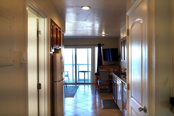 Interior - Condo #203 with beautiful sunset view from your balcony overlooking the ocean (Lincoln City)