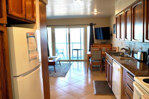 Fridge, microwave, oven, dishwasher - Condo #203 with beautiful sunset view from your balcony overlooking the ocean (Lincoln City)