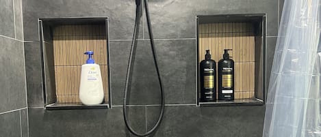 Shower, hair dryer, towels, soap