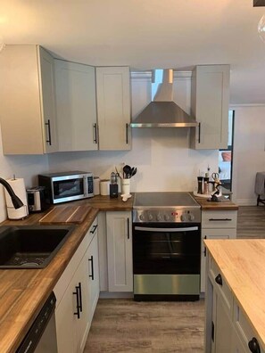 Fridge, microwave, dishwasher, toaster - The Trinity Guest Suite, Trinity Guest House (Trinity)