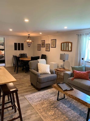 TV, fireplace - The Trinity Guest Suite, Trinity Guest House (Trinity)