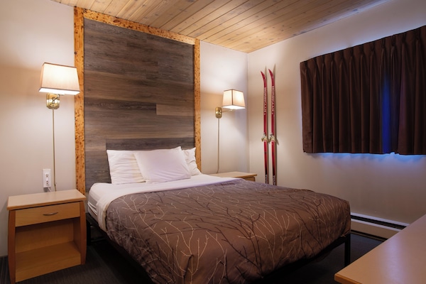 Standard Suite | Blackout drapes, iron/ironing board, free WiFi, bed sheets