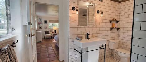 Shower, hair dryer, towels, shampoo