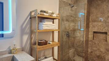 Shower, hair dryer, towels, soap