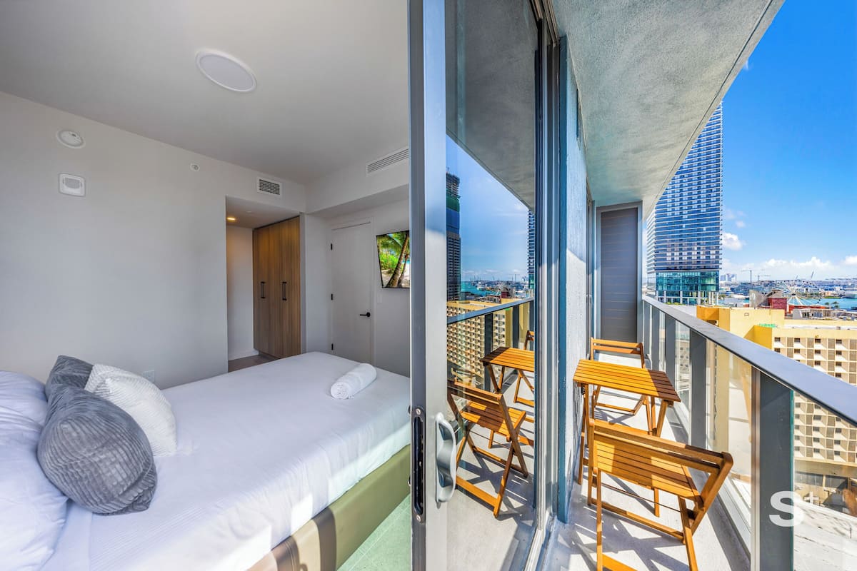 Condo, Balcony, City View | Iron/ironing board, free WiFi