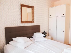 2 dormitorios, tabla de planchar con plancha, Internet y ropa de cama