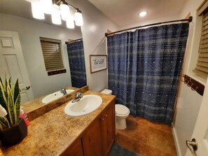 Shower, hair dryer, towels, soap - 2-bedroom townhome with 2 King Suites. Bicycle-friendly with locking shed. (Moab)