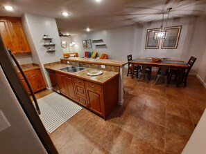 Dining - 2-bedroom townhome with 2 King Suites. Bicycle-friendly with locking shed. (Moab)