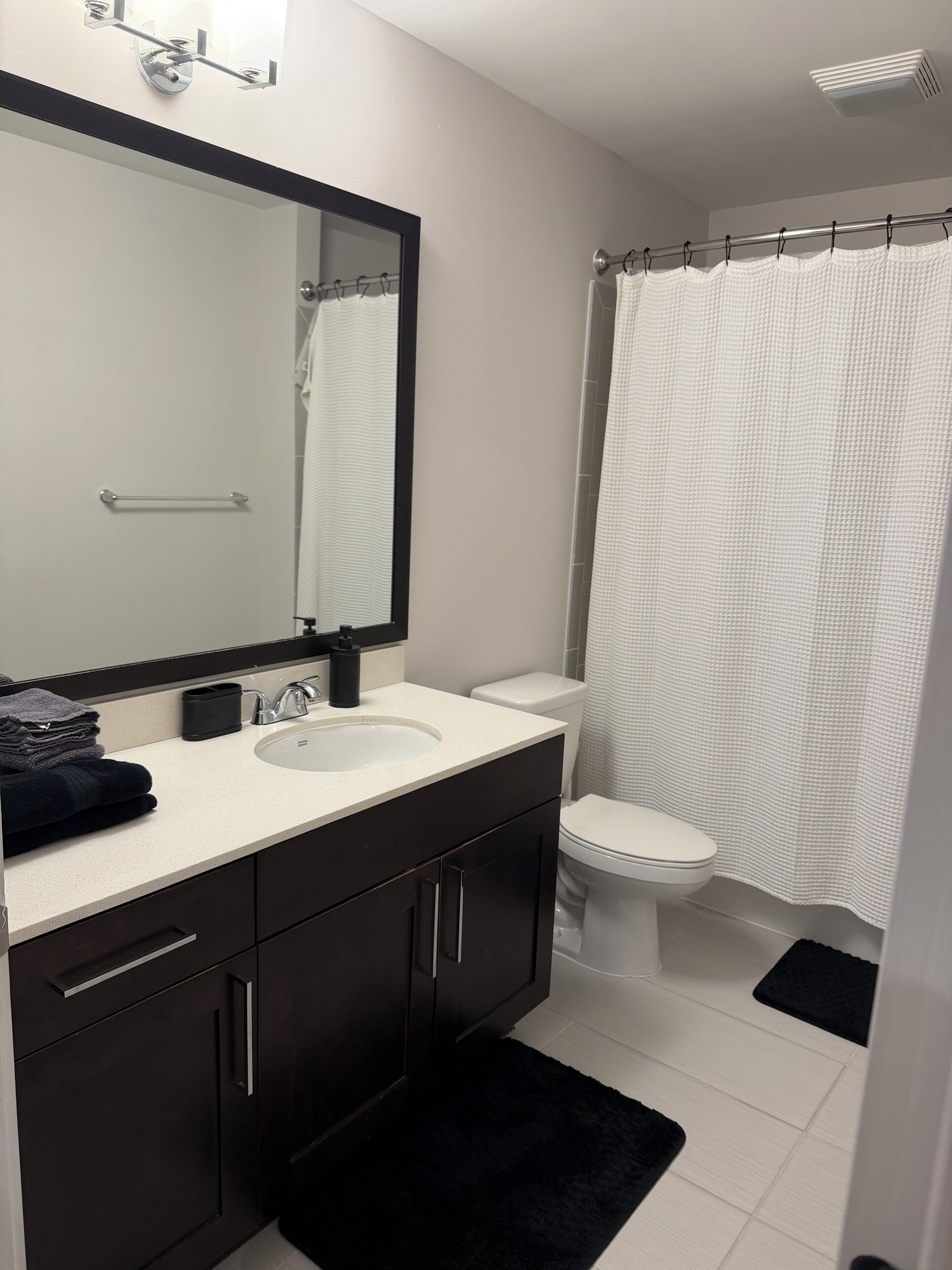 Hair dryer, towels, soap, toilet paper