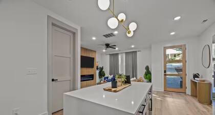 Modern Cabin Vibes – 10 Min to Uptown + Airport