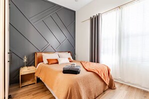 3 habitaciones, tabla de planchar con plancha, wifi y ropa de cama 