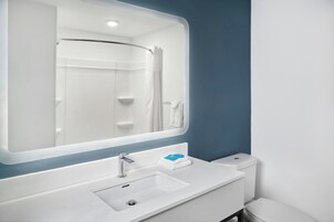 Studio, 2 Queen Beds | Bathroom | Hair dryer, towels, toilet paper