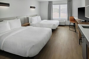 Cortinas blackout, wifi gratis y ropa de cama 