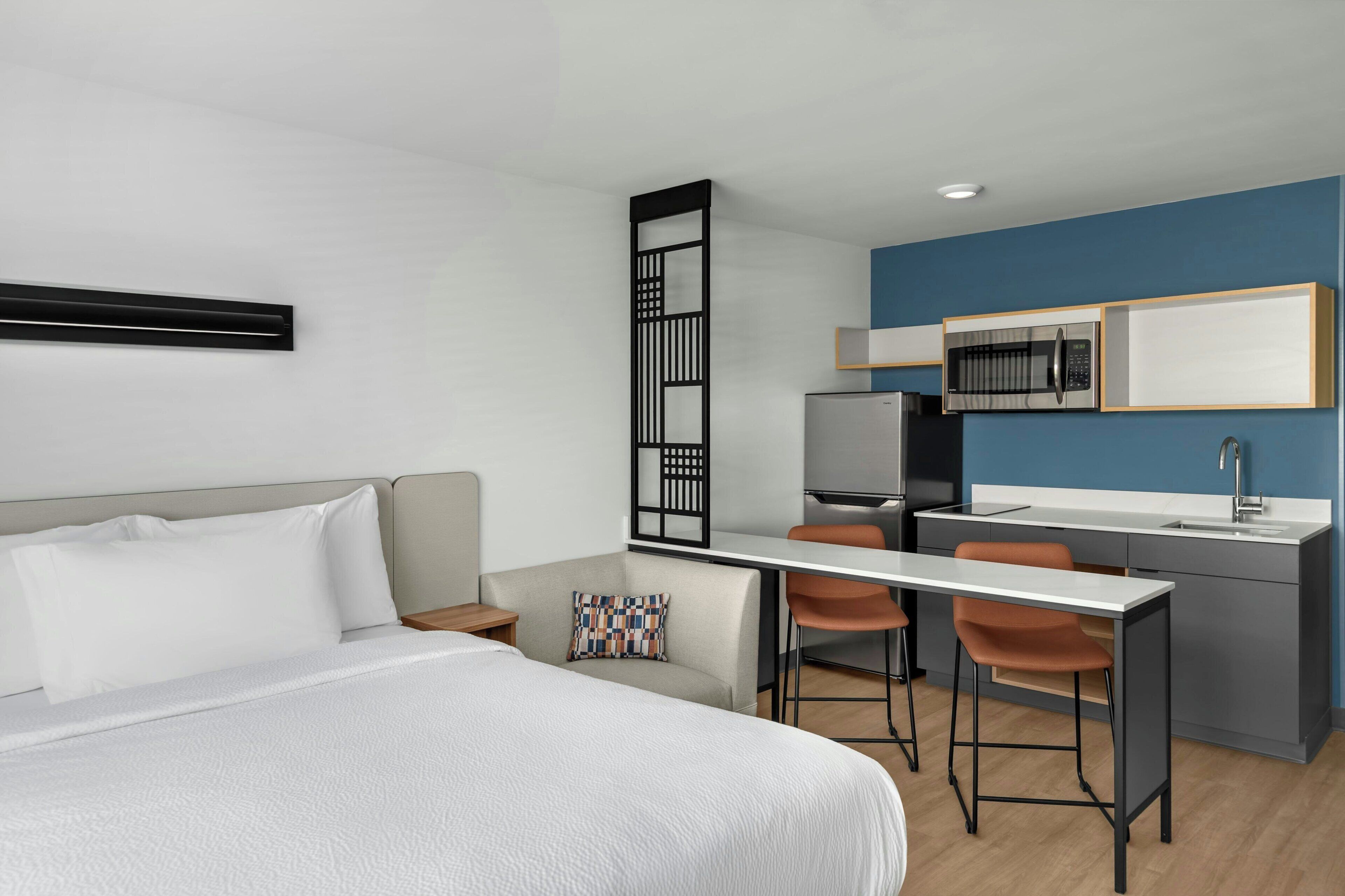 Studio, 1 Queen Bed | Private kitchen | Full-size fridge, microwave, stovetop, freezer
