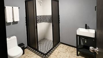 Economy Double Room, No Windows | Bathroom | Shower, towels, soap, shampoo