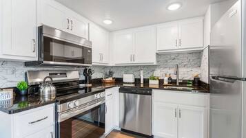 Condo, Multiple Beds, Patio (Cozy Creekside Landing) | Private kitchen
