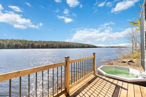 Lakefront Tiny Home w/ Hot Tub + Sunset Views