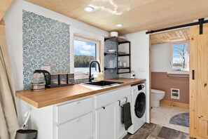 Fridge, microwave, oven, stovetop - Lakefront Tiny Home w/ Hot Tub + Sunset Views (Maitland)