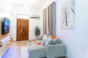 Living area - Cozy family stay in central Dar with comfort & Wi-Fi. (Dar es Salaam)