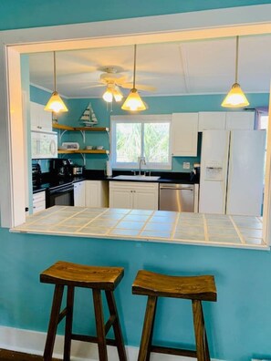 Fridge, microwave, oven, stovetop - Sea Spot - Up! Beach access/Deck/Ocean view (Folly Beach)