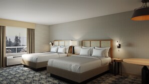 Premium bedding, pillow-top beds, desk, laptop workspace