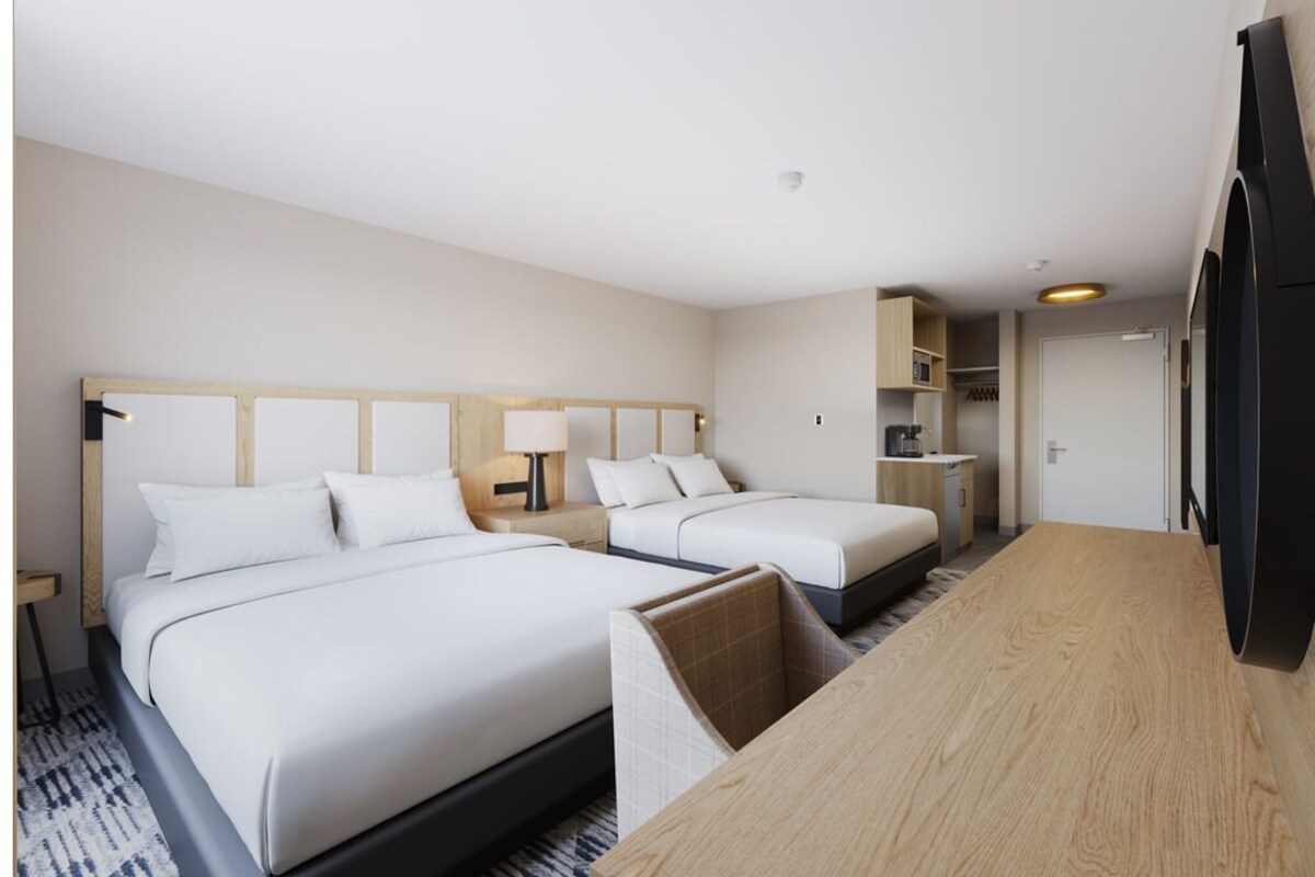 Habitación Signature, 2 camas de matrimonio | Ropa de cama de alta calidad y colchones con acolchado adicional