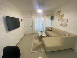 Living area - Lovely 2-bedroom apartment with AC in charming Bayahíbe 125 DOLARES POR NOCHE (Bayahíbe)