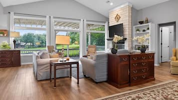 TV, fireplace, books, offices