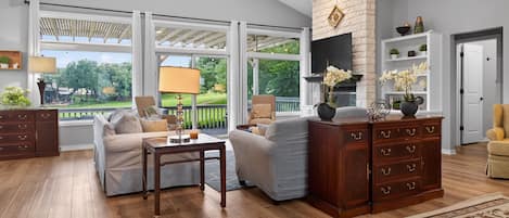 TV, fireplace, books, offices