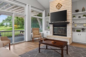 TV, fireplace, books, offices