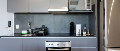 Apartment, 2 Bedrooms | Private kitchen | Microwave, stovetop, cookware/dishes/utensils