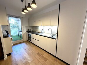 Fridge, microwave, dishwasher, toaster - Two-bedroom apartment in the city center, within walking distance to the port, shops, and beach,... (SANARY SUR MER)