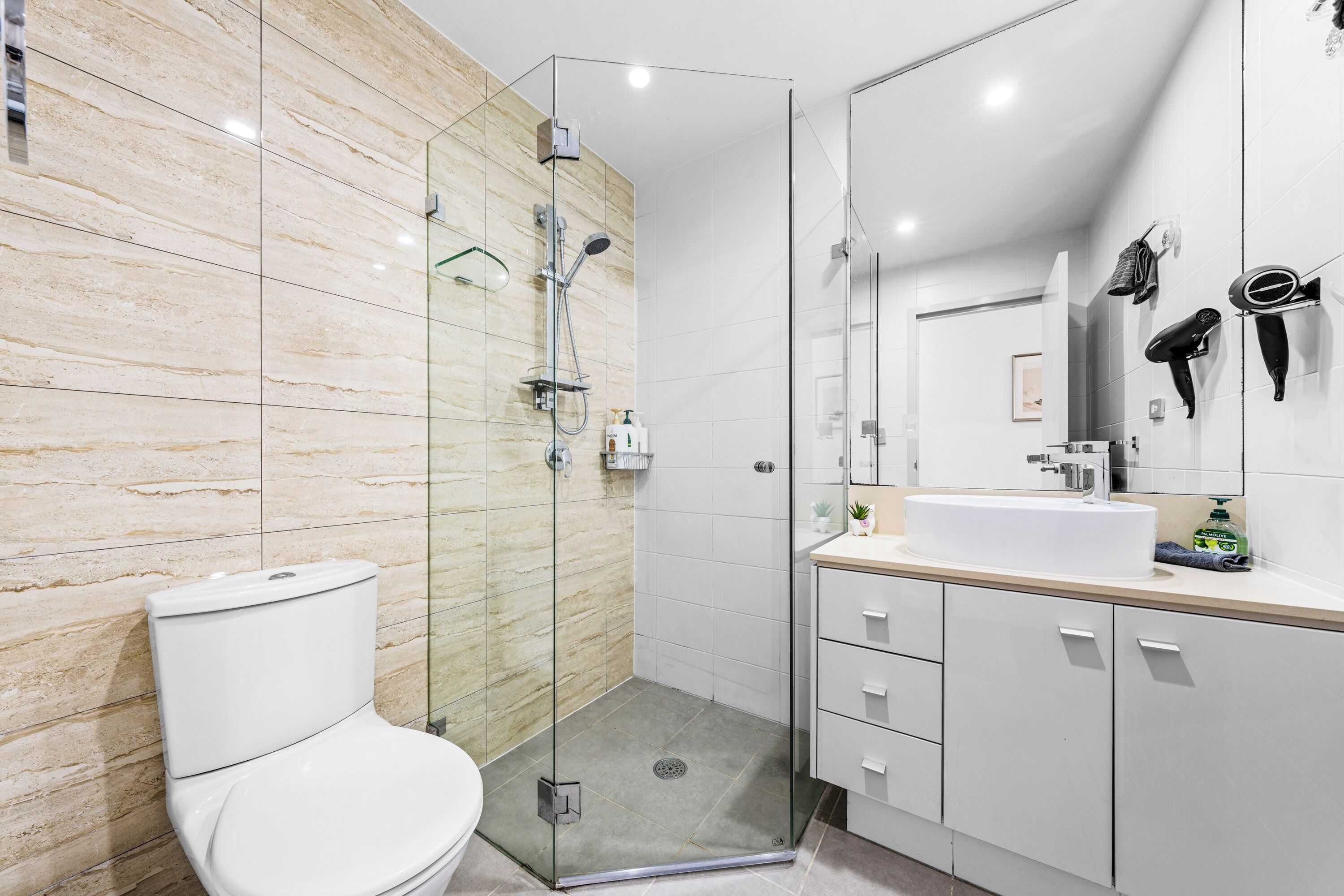 Shower, hair dryer, towels, soap