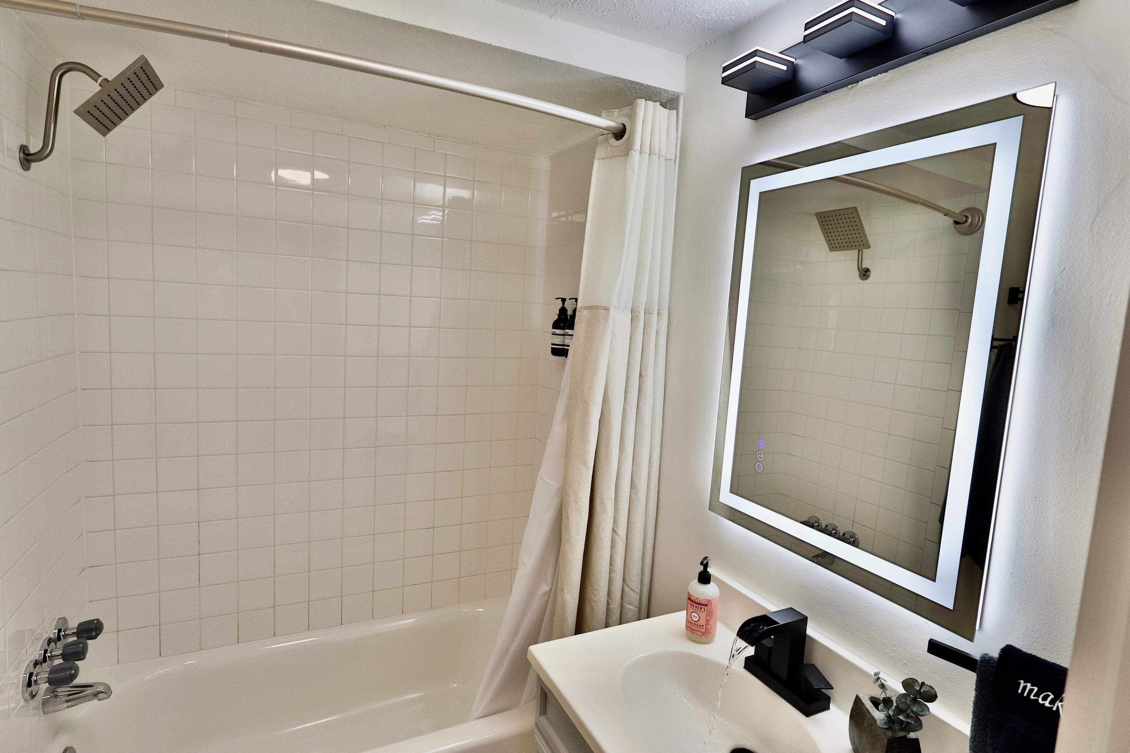 Hair dryer, towels, soap, shampoo