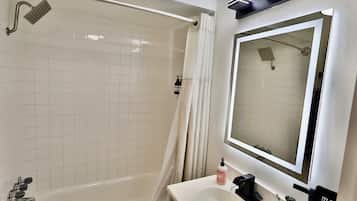 Hair dryer, towels, soap, shampoo